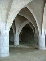 Gothic arches of the disused ossuary beside St Barbora's