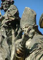 St Joseph watching over St Cyril's shoulder on the Holy Trinity Column in Olomouc